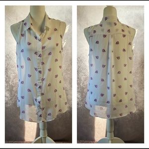 Banana Republic white button down sleeveless blouse with purple flowers